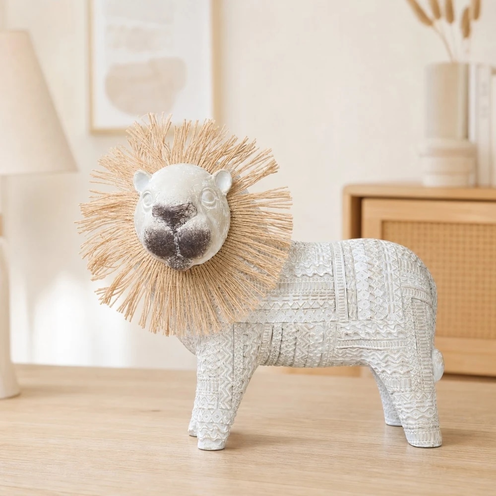 Decorative lion ornament on a shelf in a soft neutral room